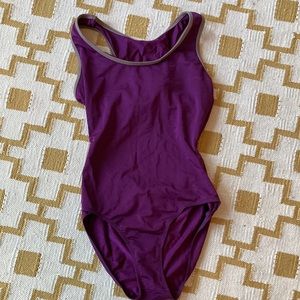 Purple racerback leotard by Mariia size Adult L. Grey/bronze trim.